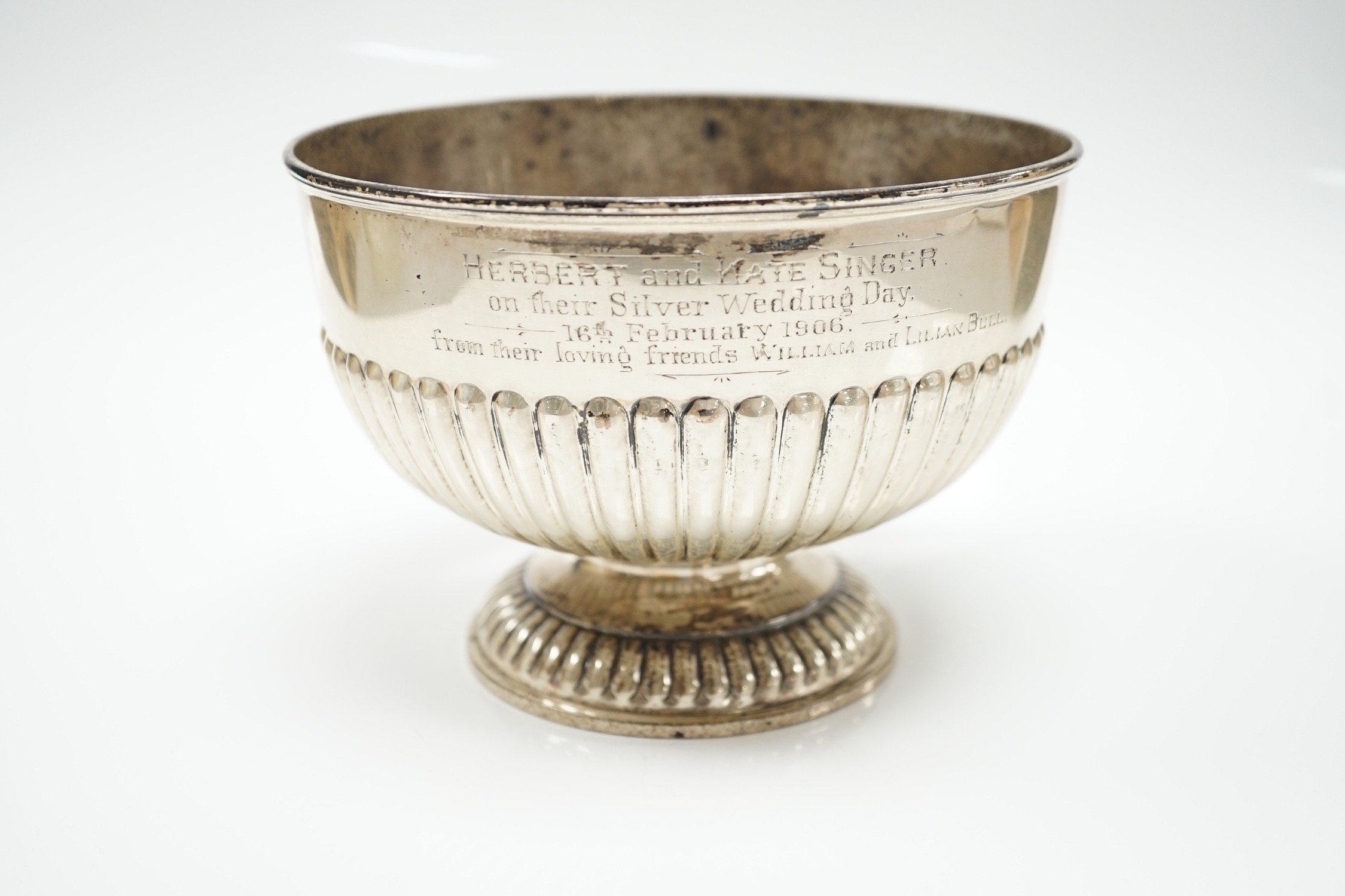 An Edwardian demi fluted silver presentation rose bowl, William Hutton & Sons, London, 1905, diameter 16.1cm, 11oz.